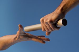 Two Hands Passing Relay Baton Race